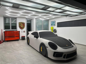 bespoke car cover that has been printed replicating the exact look of the car 